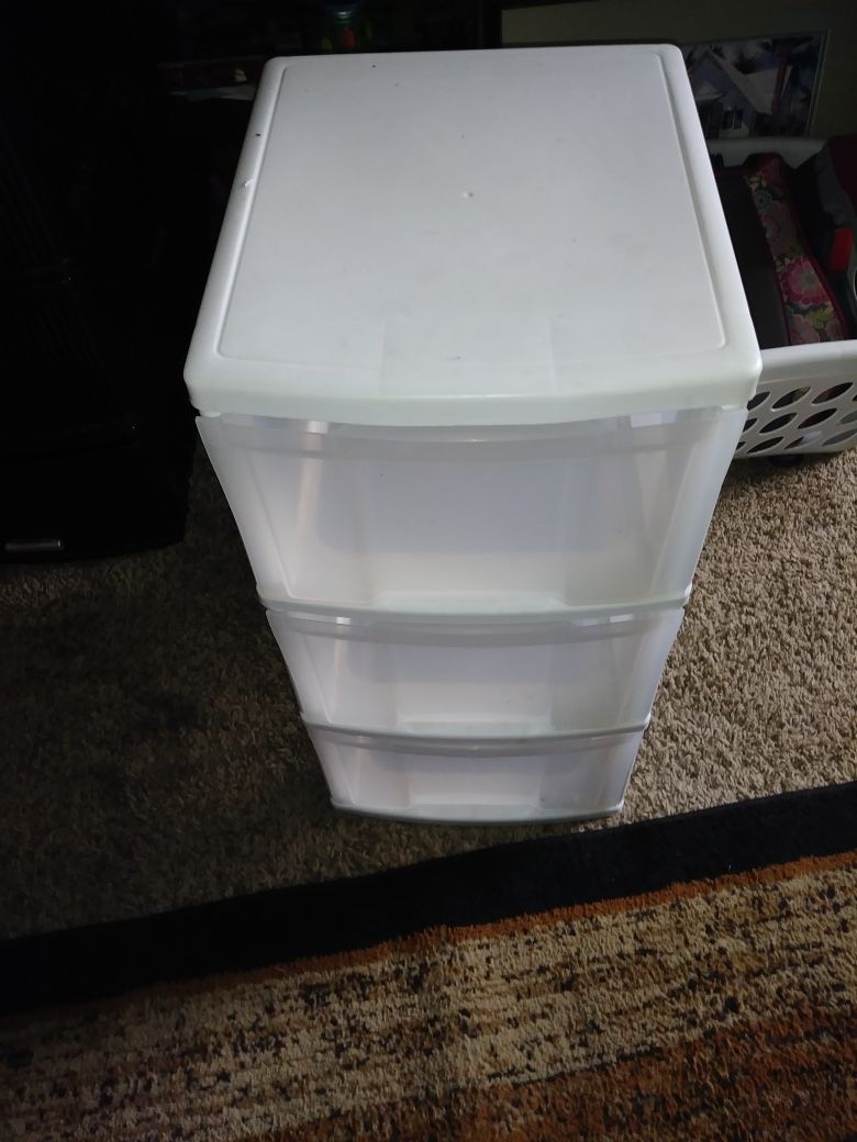 White plastic container with three drawers