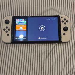 NINTENDO SWITCH OLED WITH GAMES
