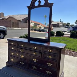 Wooden dresser with mirror: 65”wide*19”deep*34”tall