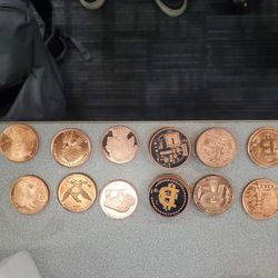 1 oz copper rounds, different  designs.