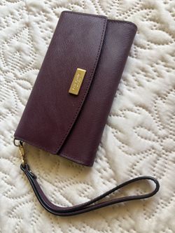Kate Spade New York plum/burgundy wristlet wallet
