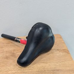 Black Bicycle Daddle with a Seatpost Vintage 