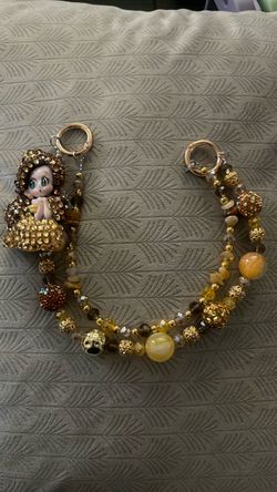 Handmade Beaded Bracelet with Doll Charm