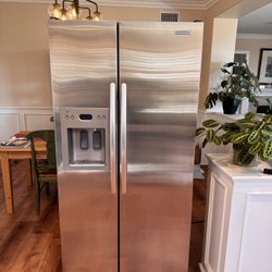 Side-by-side, full-size KitchenAid refrigerator and freezer