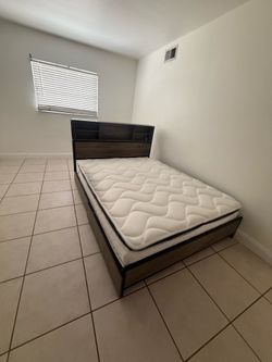 FREE. Queen bed with frame & four end tables.