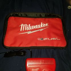 Brand New Milwaukee 12v Fuel Bag W Charger