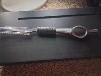 Via feather blade