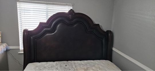 Dark Wood Upholstered Headboard with Nailhead Trim