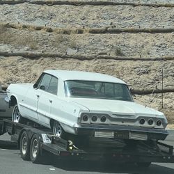 1963 Chevy Impala 4 Door. Comes With New 350 Engine And Transmission In Plastic. Cherry Picker And A 320 Engine And Transmission Edelbrock Carburetor