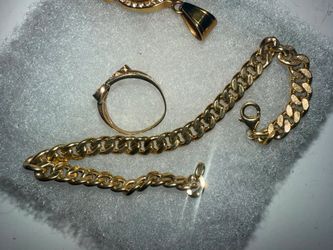 Gold chain, pendant and ring