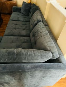 $300 - Gently used blue sectional with ottoman