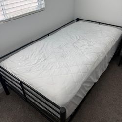 Twin bed with mattress