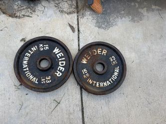2 Vintage WEIDER 33pound Olympic plates