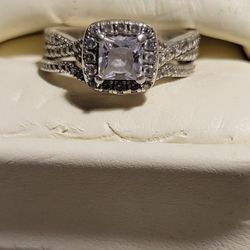 Size 7 Sterling Sivler W/ White Sapphires.