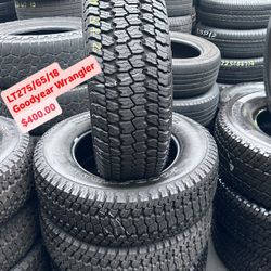 SET OF FOUR USED TIRES LT 275/65/18 GOODYEAR 