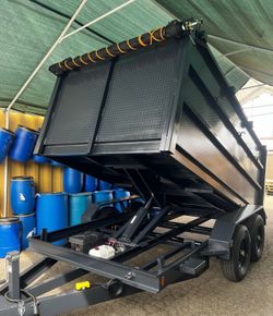 Scissor hoist dump trailer