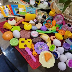 Cook Play set toys and small books.