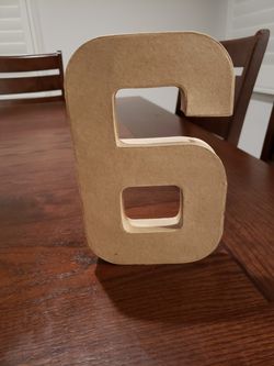 Number 6 or 9 made from cardboard