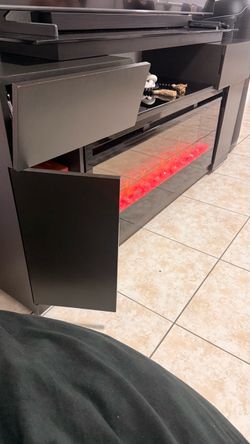🔥 Dimplex Electric Fireplace TV Stand – $600