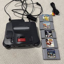 Nintendo 64 system with expansion pack, hdmi adapter and 5 games.