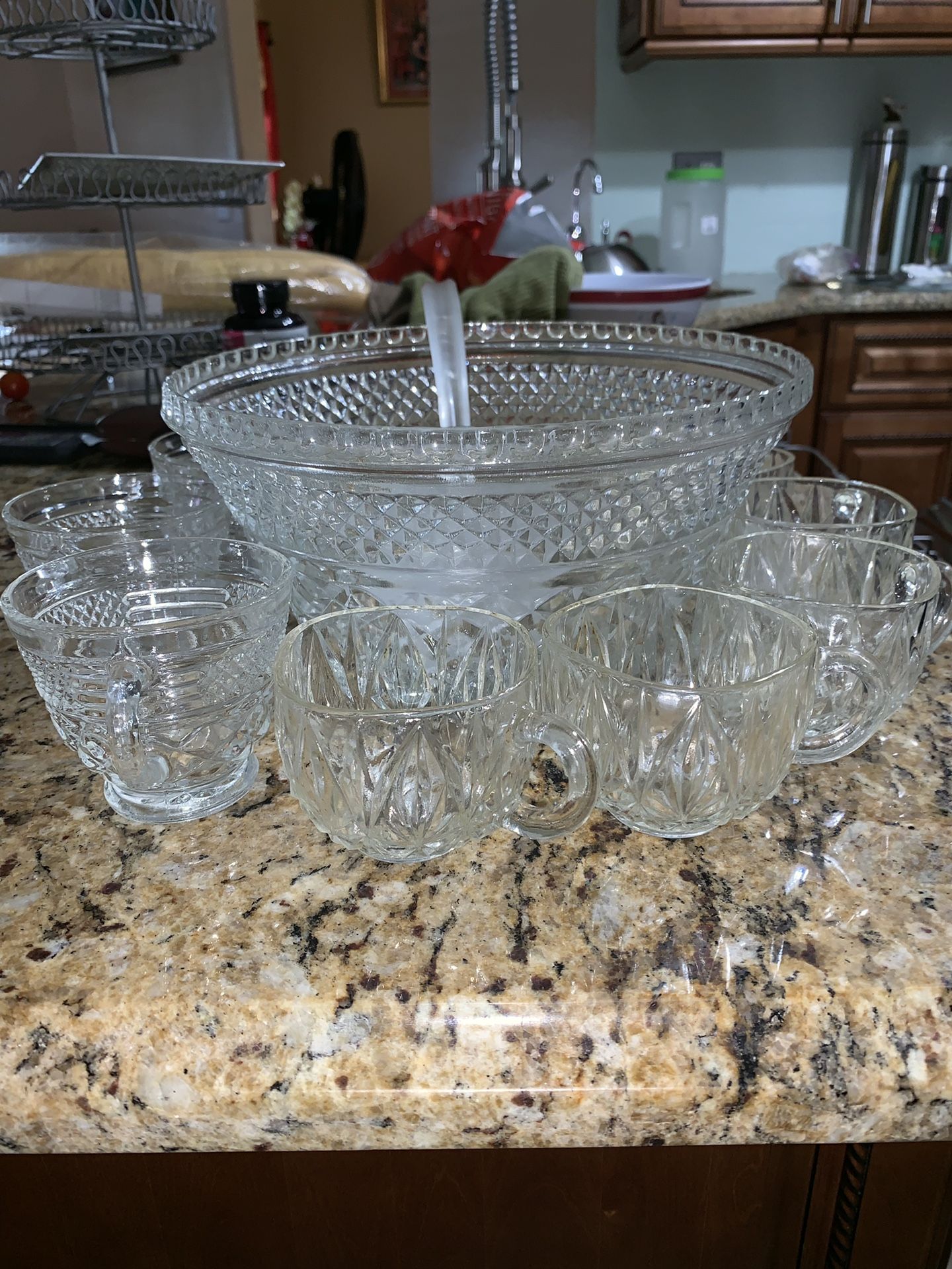 Glass punch bowl with cups and ladle