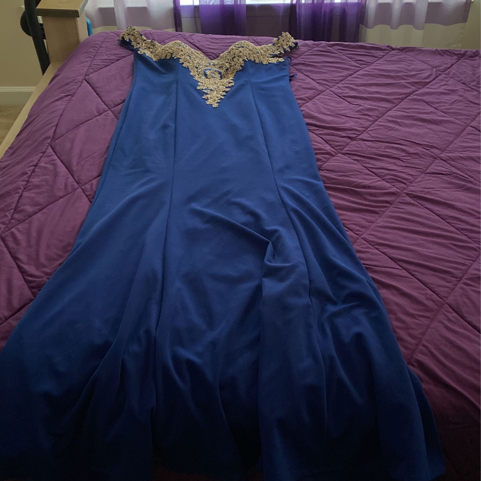 Off shoulder Royal blue and gold evening gown 