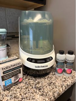 Baby bezza bottle washer machine