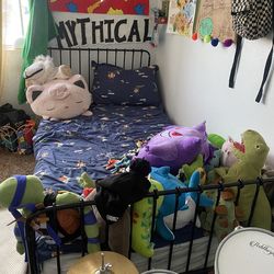 Black metal twin bed