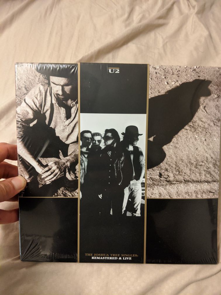 New U2 "Joshua Tree Singles" vinyl and 2 disc cd and photobook