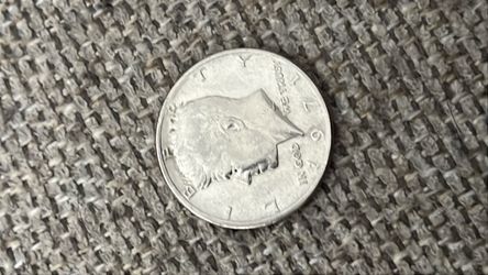 Silver-Toned Coin with Animal Design