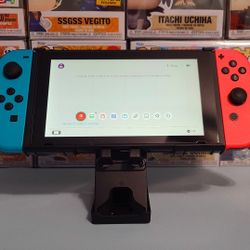 Nintendo Switch 1 - Console & Grip