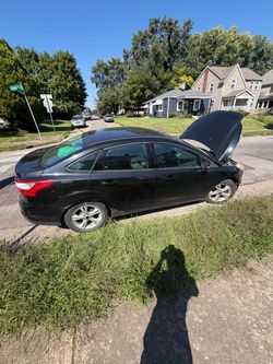 Ford Focus Black Sedan – Hood Open