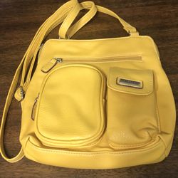 Strada women’s crossbody bag multiple  outside and inside zip pockets yellow.