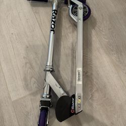 Razor A2 Kick Scooter for Kids – Wheelie Bar, Foldable, Lightweight, Front Vibration Reducing System, Adjustable Height Handlebars