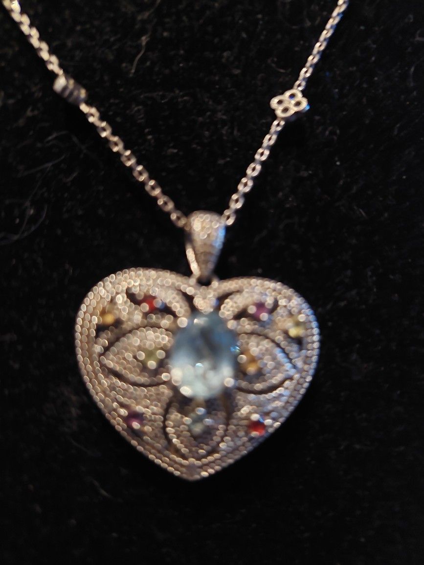1 CT BLUE TOPAZ AND MULTI GEM HEART LOCKET