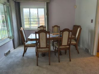 Dining room table with leaf and chairs