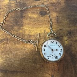Armed Gold Pocket Watch 