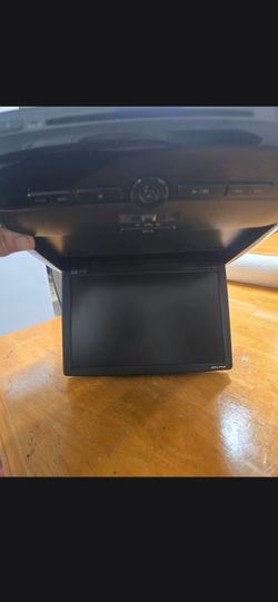 Alpine DVD pull down screen vehicle DVD entertainment system $250 wireless headset included