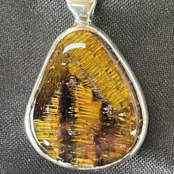 Spectacular Cacoxenite Quartz Pendant