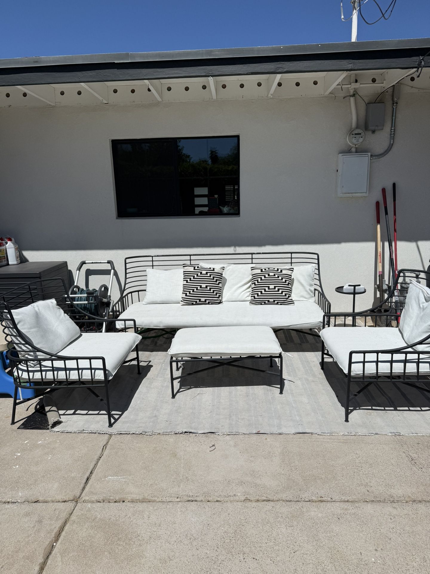 CB2 Breton 83” Black gMetal Outdoor Sofa + Chairs with Outdoor Covers