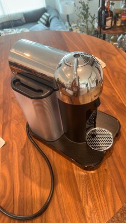 Nespresso Vertuo Espresso Maker by Breville in a chrome and black finish