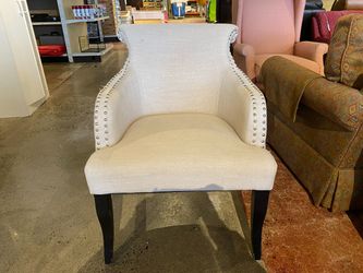 White Armchair with Nailhead Trim and Curved Headrest