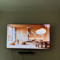 Like New   TWO  75 Inch TVS 