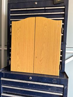 Dartboard with cabinet