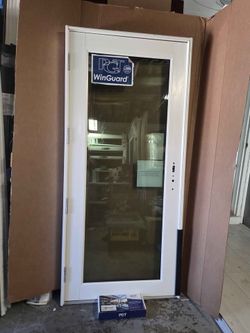 Brand New 36W x 80H PGT Impact French Door with Frame and Handles.