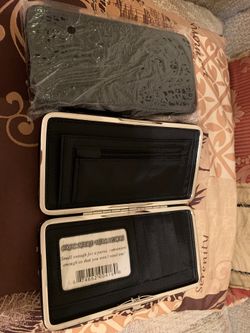Women wallet brand new In plastic $16.00 for both