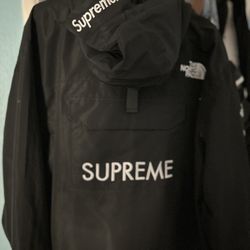 Veste supreme x the north cheap face