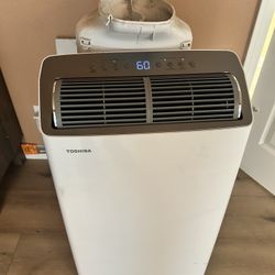 Toshiba 14000 Btu Air conditioner . Comes with window connector and hose