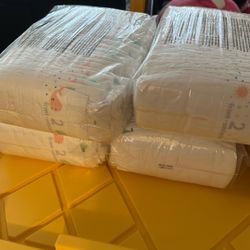 5 Packs Of Size 2 Diapers 