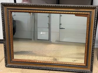 Mirror with wooden frame
